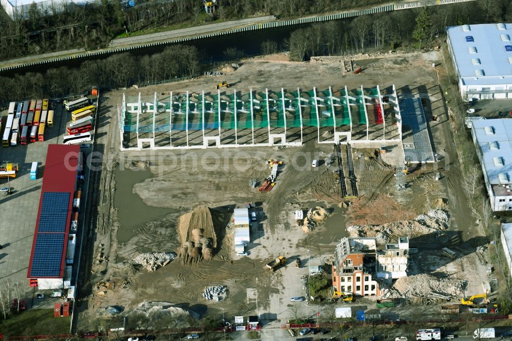 Berlin from the bird's eye view: Construction site to build a new building complex on the site of the logistics center DHL Express Germany on Industriestrasse in the district Tempelhof in Berlin, Germany