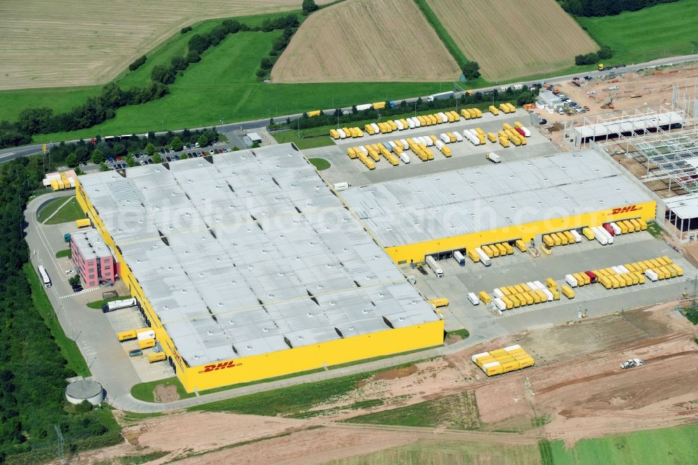 Aerial image Ludwigsau - Construction site to build a new building complex on the site of the logistics center of DHL Paket GmbH Im Fuldatal in Ludwigsau in the state Hesse, Germany