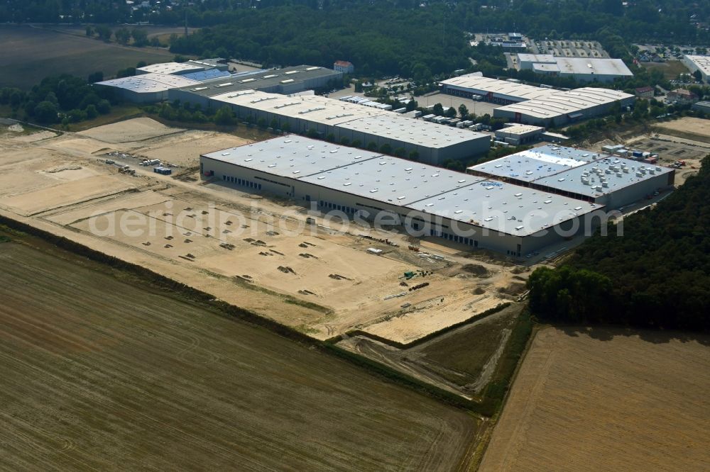 Rangsdorf from the bird's eye view: Construction site to build a new building complex on the site of the logistics center in the district Gross Machnow in Rangsdorf in the state Brandenburg, Germany