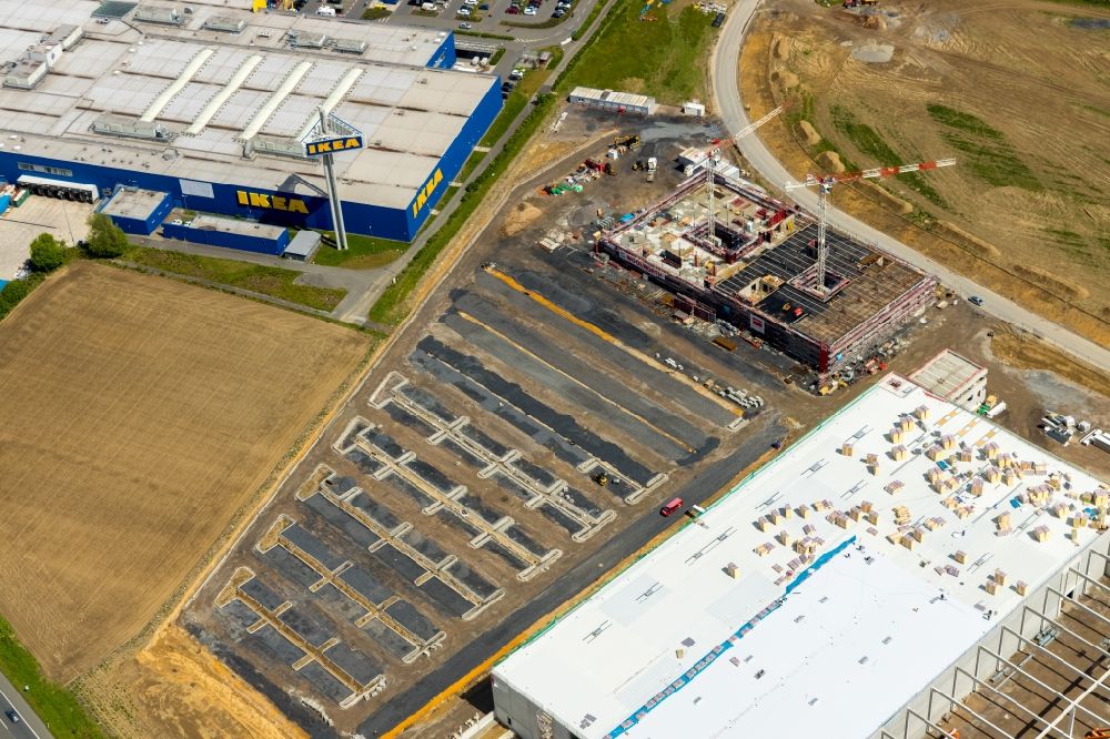 Kamen from the bird's eye view: Construction site to build a new building complex on the site of the logistics center of Woolworth GmbH in the district Alte Colonie in Kamen in the state North Rhine-Westphalia, Germany