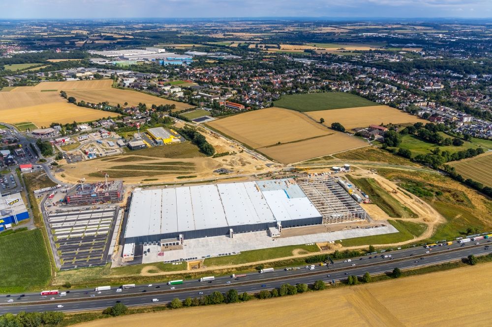 Unna from above - Construction site to build a new building complex on the site of the logistics center of Woolworth GmbH in the district Alte Colonie in Kamen in the state North Rhine-Westphalia, Germany