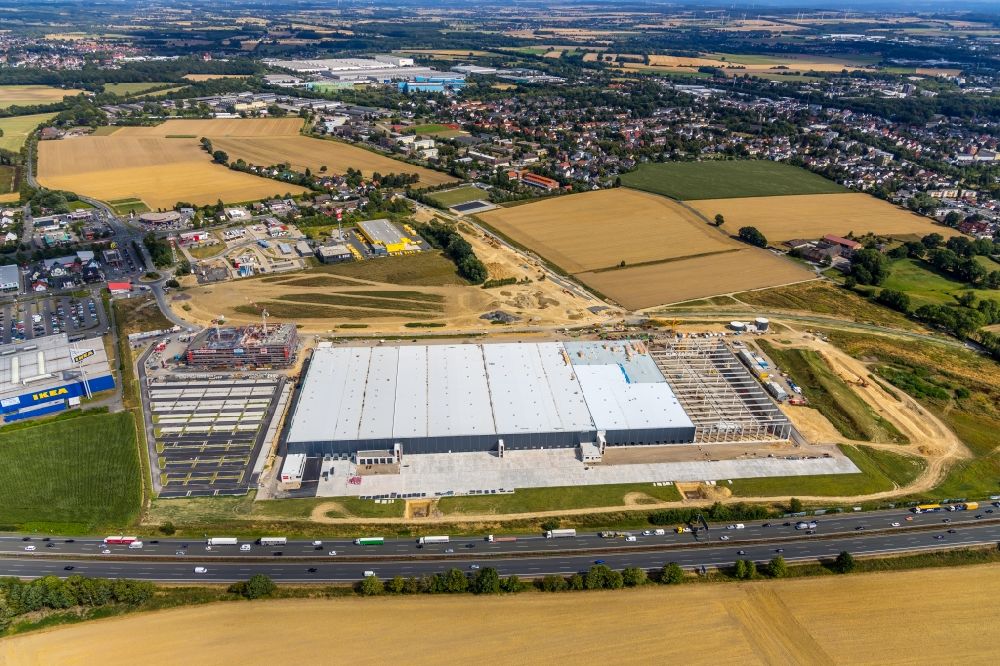 Unna from the bird's eye view: Construction site to build a new building complex on the site of the logistics center of Woolworth GmbH in the district Alte Colonie in Kamen in the state North Rhine-Westphalia, Germany