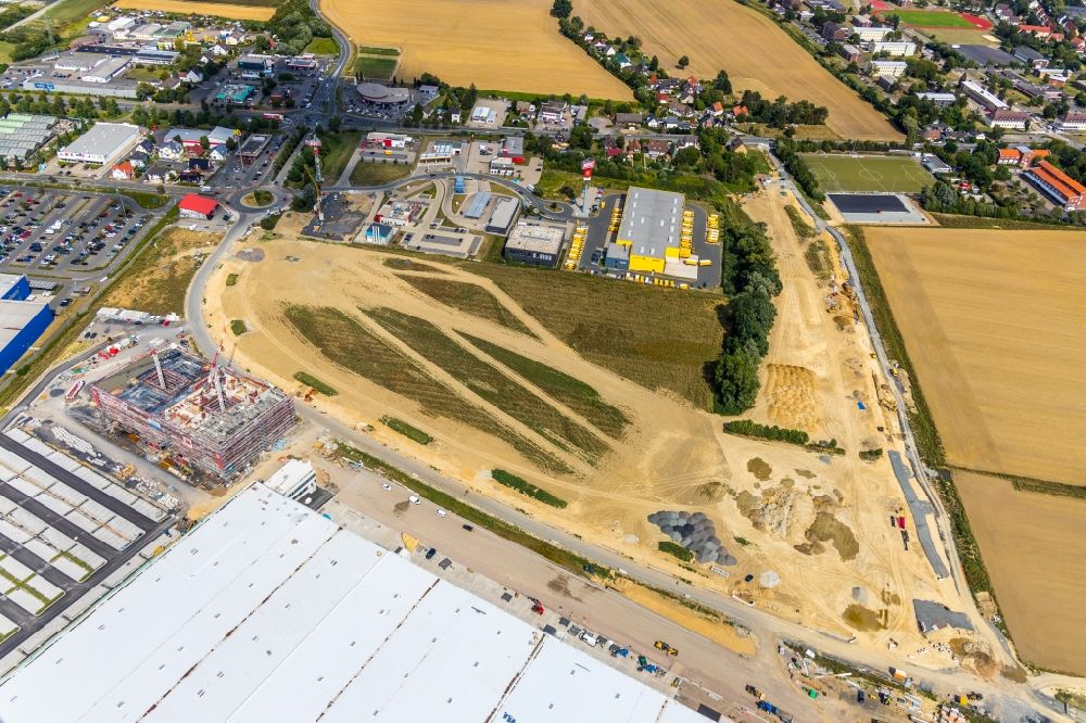 Aerial photograph Unna - Construction site to build a new building complex on the site of the logistics center of Woolworth GmbH in the district Alte Colonie in Kamen in the state North Rhine-Westphalia, Germany
