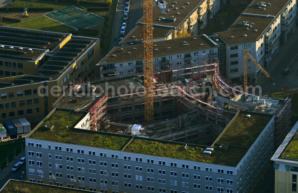 Berlin from the bird's eye view: Construction of a building complex of university Alice Salomon Hochschule Berlin on Kokoschkaplatz on street Lyonel-Feininger-Strasse in the district Hellersdorf in Berlin, Germany