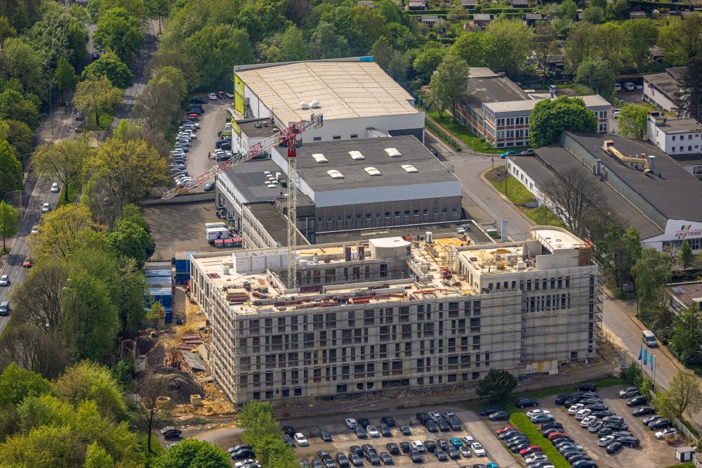 Aerial photograph Essen - Construction site for the new building complex of the FOM University of Applied Sciences on Leimkugelstrasse in the Nordviertel district of Essen in the Ruhr area in the federal state of North Rhine-Westphalia, Germany