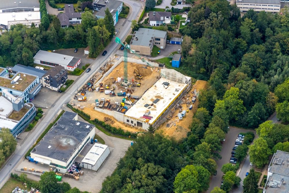 Heiligenhaus from the bird's eye view: Construction site for the new building of a building complex on Weilenburgstrasse in Heiligenhaus in the state North Rhine-Westphalia, Germany