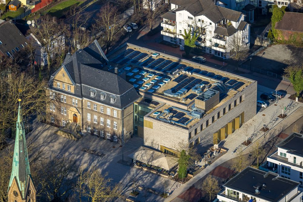 Holzwickede from the bird's eye view: Construction site of Town Hall building of the city administration als Erweiterungsbau Am Markt - Poststrasse in the district Brackel in Holzwickede in the state North Rhine-Westphalia, Germany