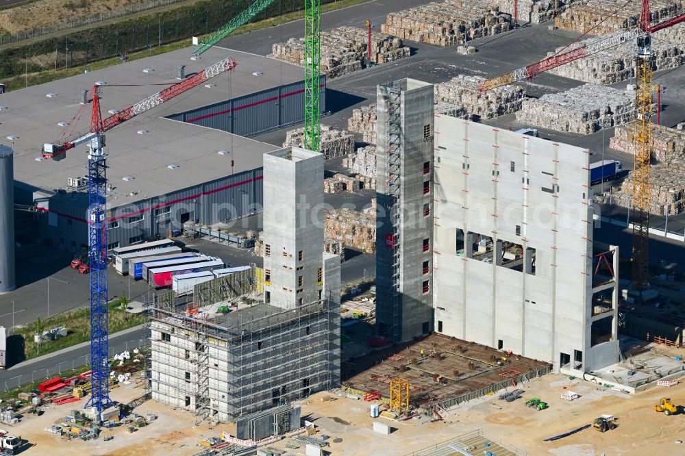 Sandersdorf from the bird's eye view: Construction site for the new construction of the power plant of the power and thermal power station Waste-to-Energy-Kraftwerk of the paper and cardboard factory of the Progroup AG on the street Sonnenseite in Sandersdorf in the state Saxony-Anhalt, Germany
