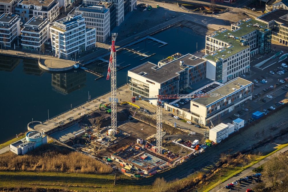 Aerial image Dortmund - Construction site for new high-rise building complex Comunita Residenz am Phoenix See An den Emscherauen - Hafenpromenade in the district Hoerde in Dortmund in the state North Rhine-Westphalia, Germany