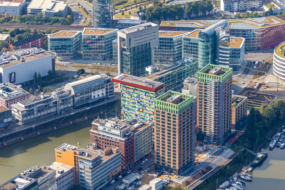 Düsseldorf from the bird's eye view: Construction site for new high-rise building complex Duesseldorfer Heimathafen of the project WIN WIN on Speditionstrasse in Duesseldorf in the state North Rhine-Westphalia, Germany