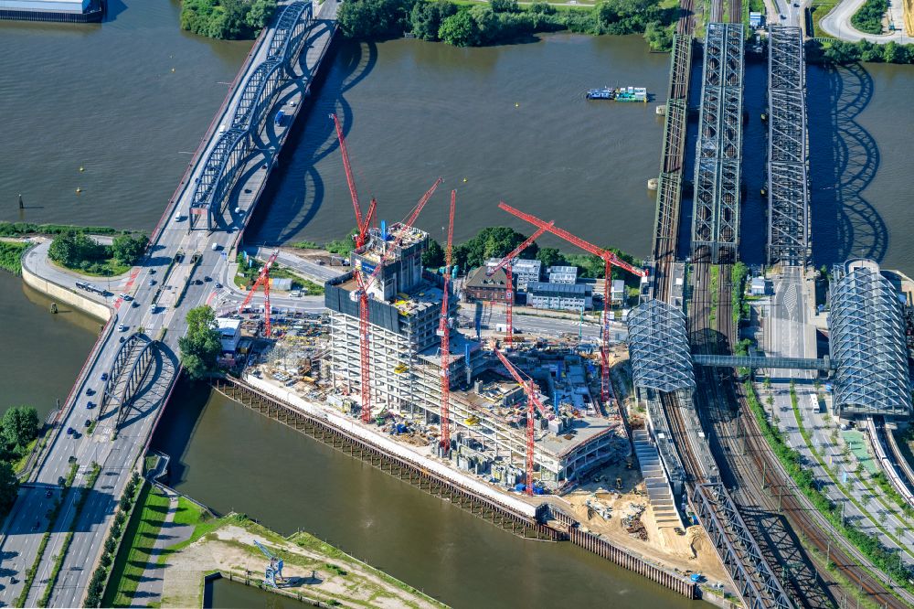 Hamburg from the bird's eye view: Construction site for new high-rise building complex Elbtower on Zweibrueckenstrasse between Oberhafenkanal and Norderelbe in the district HafenCity in Hamburg, Germany