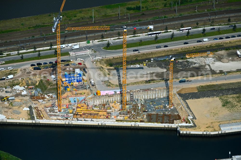 Aerial image Hamburg - Construction site for new high-rise building complex Roots on street Versmannstrasse - Lucy-Borchardt-Strasse on Baakenhafen in the district HafenCity in Hamburg, Germany