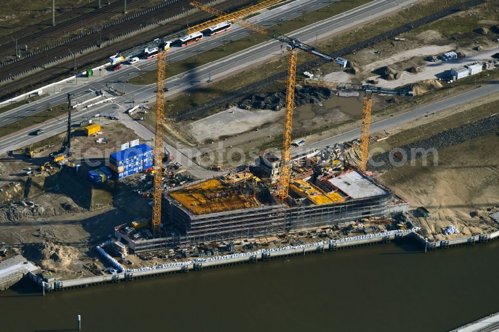 Aerial photograph Hamburg - Construction site for new high-rise building complex Roots on street Versmannstrasse - Lucy-Borchardt-Strasse on Baakenhafen in the district HafenCity in Hamburg, Germany