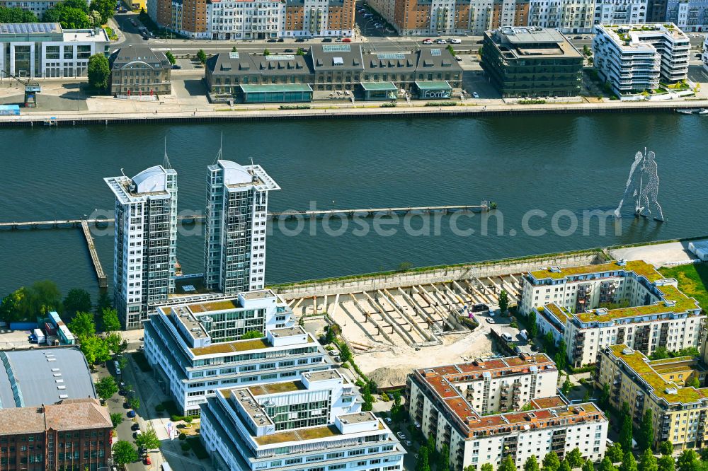 Aerial photograph Berlin - Construction site for new high-rise building complex on river site of Spree along the Fanny-Zobel-Strasse in the district Treptow in Berlin, Germany