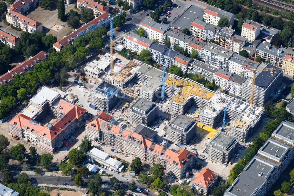 Aerial image Berlin - Construction site for new high-rise building complex am Wohnpark St. Marien in the district Neukoelln in Berlin, Germany