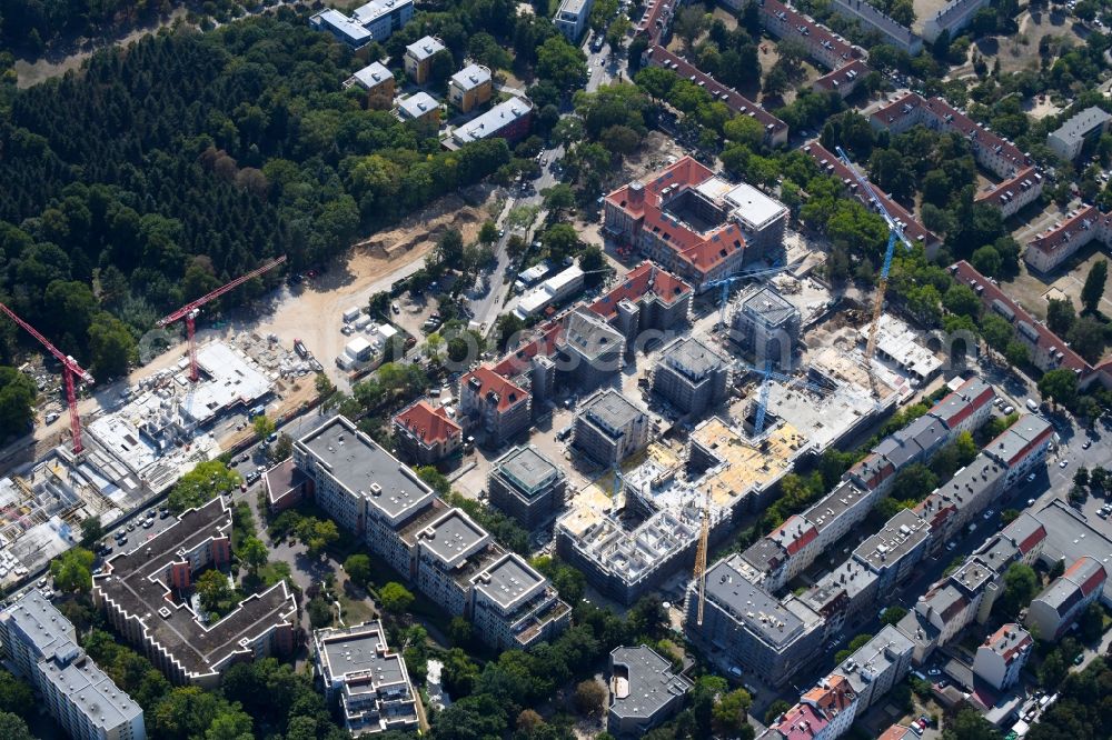 Berlin from the bird's eye view: Construction site for new high-rise building complex am Wohnpark St. Marien in the district Neukoelln in Berlin, Germany