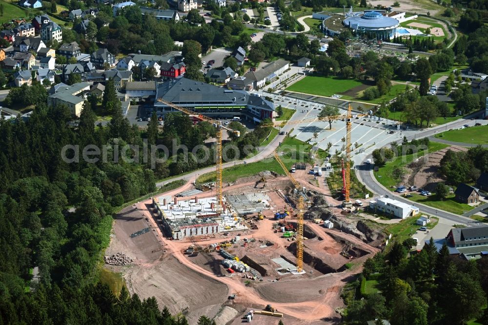 Oberhof from the bird's eye view: New construction site the hotel complex of The Grand Green - Familux Resort on Tambacher Strasse in Oberhof in the state Thuringia, Germany