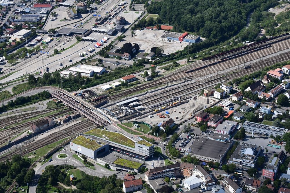 Aerial image Weil am Rhein - Construction site and ground works for the new construction of the department store building Dreilaendergalerie next to the Peace-bridge and the shopping mall Einkauf - Insel in Weil am Rhein in the state Baden-Wurttemberg, Germany