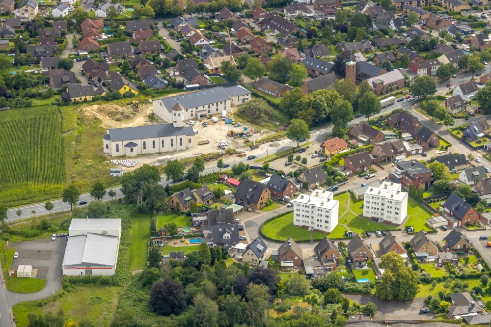Aerial photograph Ahlen - Construction site for the new building of the church building of the St. Georgkirche and Gemeindezentrum St. Georg on street Paul-Gerhardt-Strasse in Ahlen in the state North Rhine-Westphalia, Germany