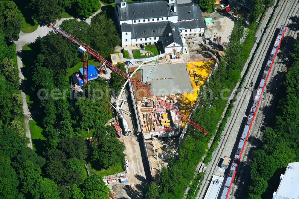 München from above - Construction site for the new building of crematory and funeral hall for burial in the grounds of the cemetery Ost Friedhof Am Giesinger Feld in the district Obergiesing-Fasangarten in Munich in the state Bavaria, Germany