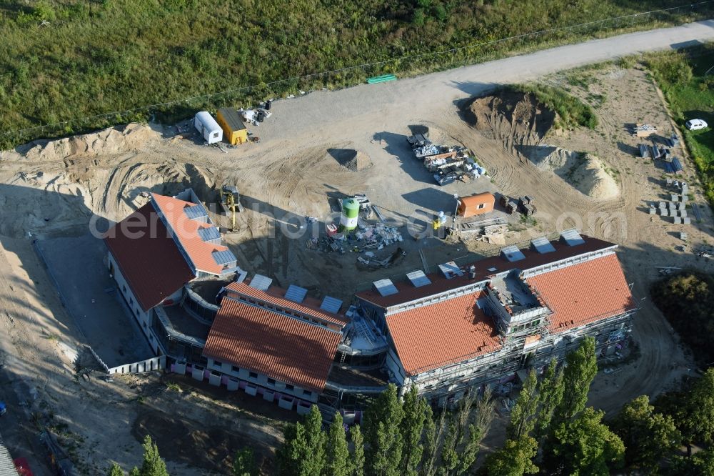 Aerial image Werneuchen - Construction site for the new building an office and administration building der Berger Bau GmbH at Alte Hirschfelder Strasse in Werneuchen in the state Brandenburg
