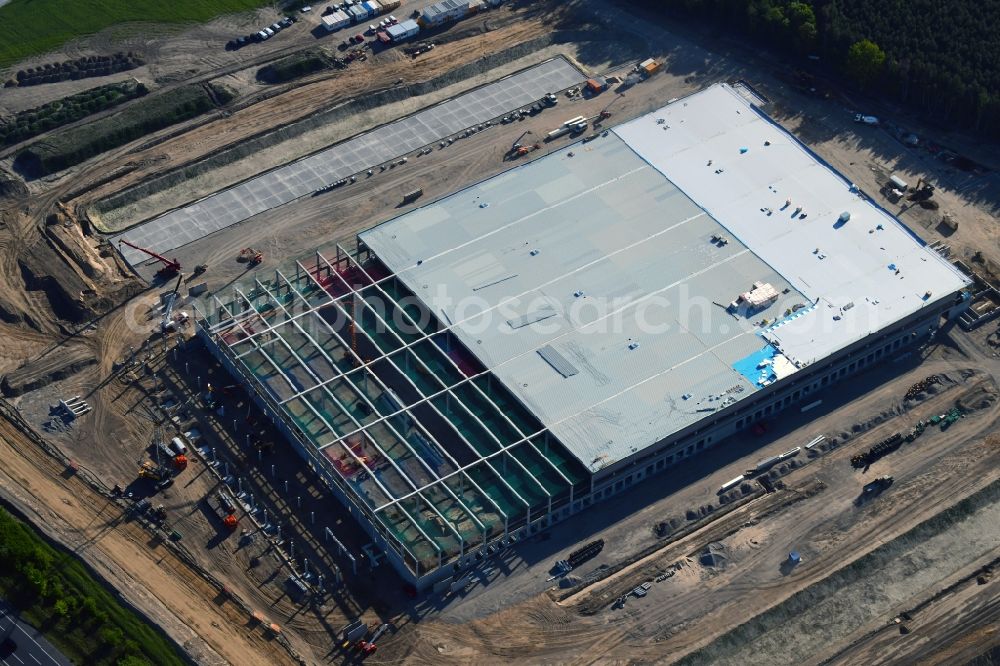 Aerial photograph Kiekebusch - Construction site for the construction of a logistics center of the Achim Walder retailer Amazon in Kiekebusch in the state of Brandenburg, Germany
