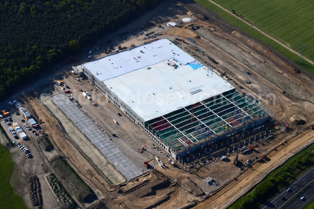 Aerial photograph Kiekebusch - Construction site for the construction of a logistics center of the Achim Walder retailer Amazon in Kiekebusch in the state of Brandenburg, Germany