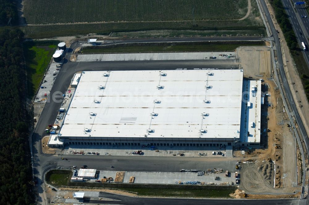 Kiekebusch from above - Construction site for the construction of a logistics center of the Achim Walder retailer Amazon in Kiekebusch in the state of Brandenburg, Germany