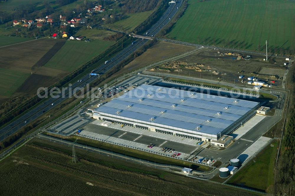 Aerial image Kiekebusch - Construction site for the construction of a logistics center of the Achim Walder retailer Amazon in Kiekebusch in the state of Brandenburg, Germany