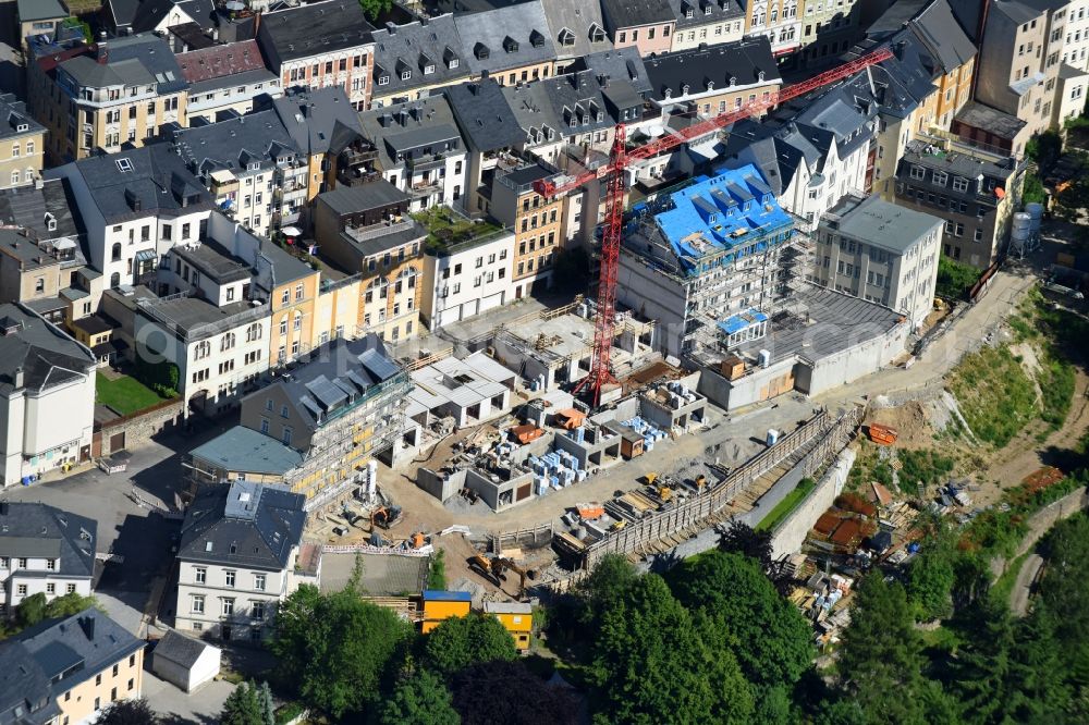 Annaberg-Buchholz from the bird's eye view: Construction site to build a new multi-family residential complex a?? Altstadtwohnen in Muenzviertel a?? on Johannisgasse - Promenadenweg in the district Frohnau in Annaberg-Buchholz in the state Saxony, Germany