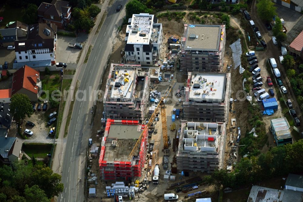 Aerial photograph Stahnsdorf - Construction site for the construction of an apartment building Baeke-Quartier on Wilhelm-Kuelz-Strasse in Stahnsdorf in the state of Brandenburg, Germany