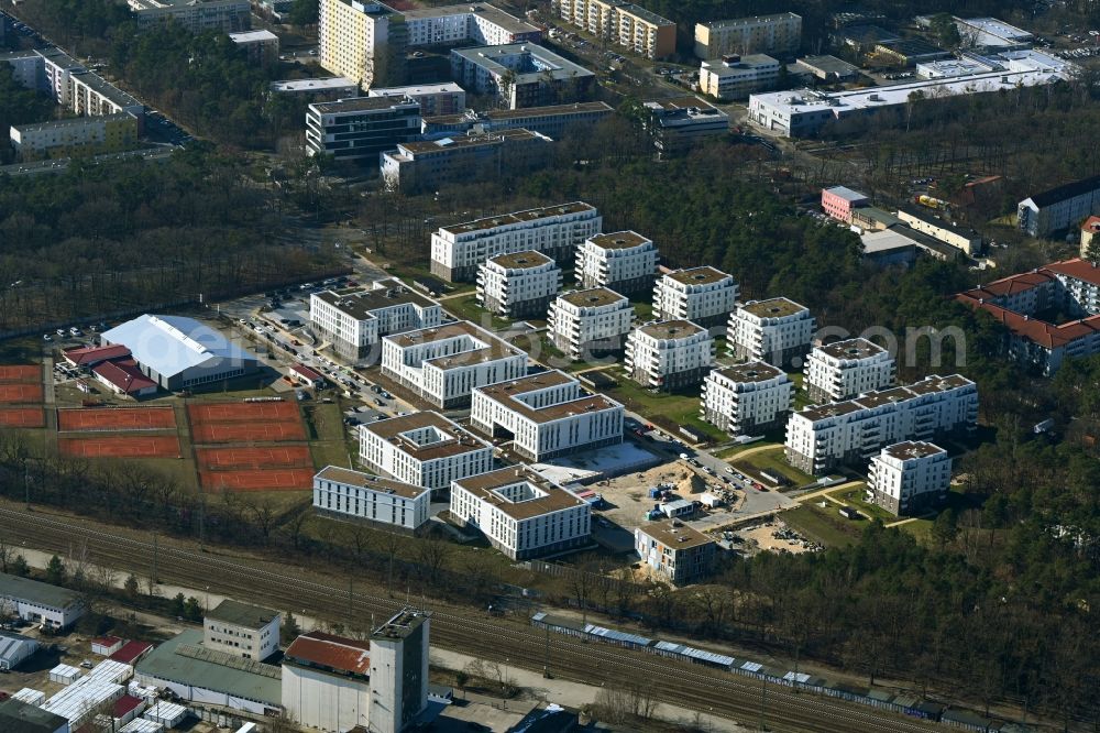 Potsdam from above - Construction site to build a new multi-family residential complex at Heinrich-Mann-Avenue in the district Waldstadt I in Potsdam in the state Brandenburg. Involved company is Heinrich-Mann-Allee 95 Grundstuecksgesellschaft mbH