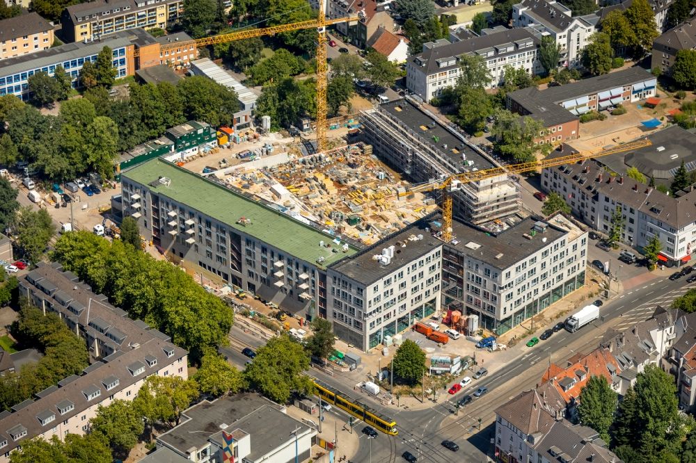 Essen from the bird's eye view: Construction site to build a new multi-family residential complex Cranachhoefe in Essen in the state North Rhine-Westphalia, Germany