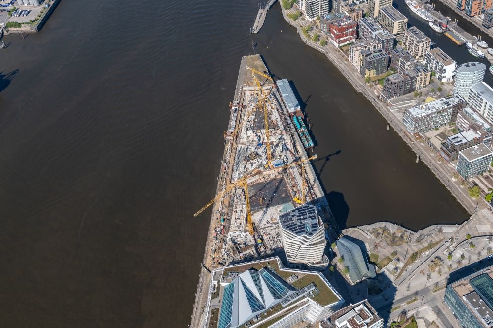 Hamburg from above - Construction site to build a new multi-family residential complex of DC DEVELOPMENTS GMBH & CO. KG on Strandkai in the district HafenCity in Hamburg, Germany