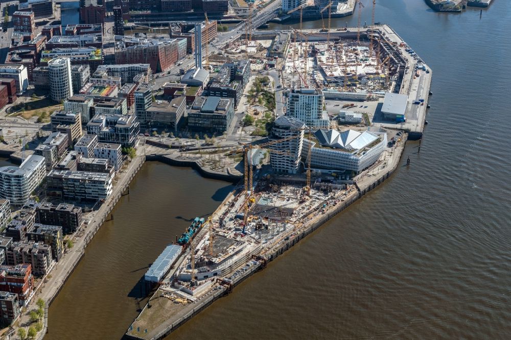 Hamburg from above - Construction site to build a new multi-family residential complex of DC DEVELOPMENTS GMBH & CO. KG on Strandkai in the district HafenCity in Hamburg, Germany