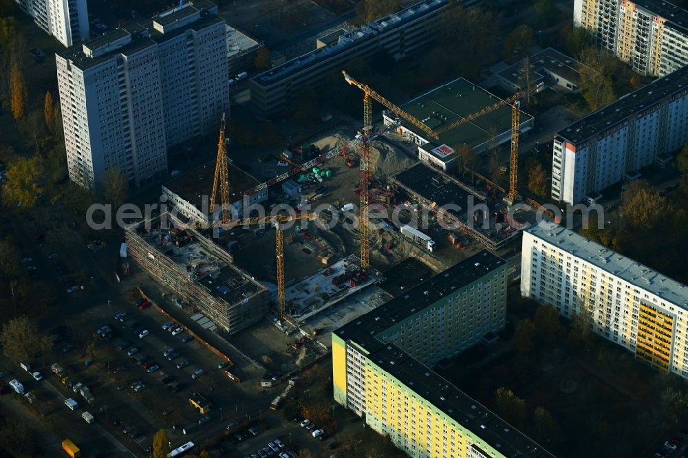 Berlin from above - Construction site to build a new multi-family residential complex Dolgensee-Center on Dolgenseestrasse in the district Lichtenberg in Berlin, Germany