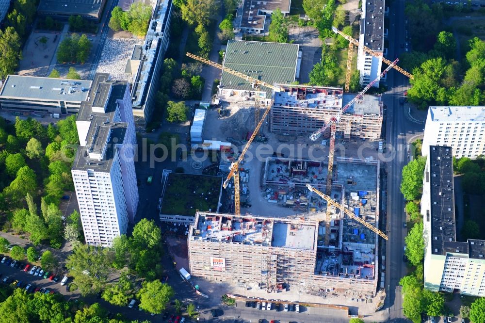 Aerial photograph Berlin - Construction site to build a new multi-family residential complex Dolgensee-Center on Dolgenseestrasse in the district Lichtenberg in Berlin, Germany