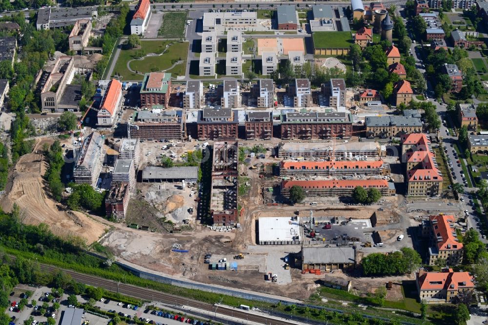 Leipzig from the bird's eye view: Construction site to build a new multi-family residential complex on the former Kasernengelaende on Olbrichtstrasse in Leipzig in the state Saxony, Germany