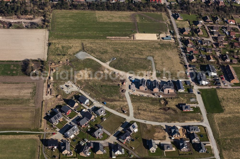 Aerial image Wyk auf Föhr - Construction site to build a new multi-family residential complex and Einfamilienhaeuser in Wyk auf Foehr in the state Schleswig-Holstein, Germany