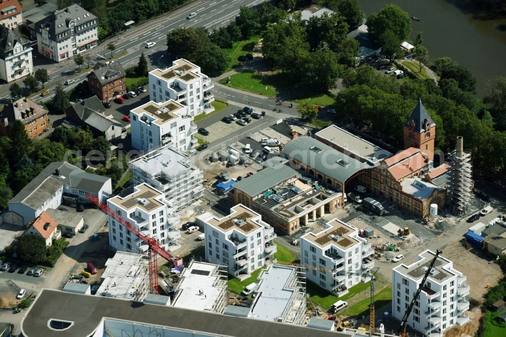 Gießen from the bird's eye view: Construction site to build a new multi-family residential complex along the Rodheimer Strasse - Henriette-Hezel-Strasse in Giessen in the state Hesse, Germany