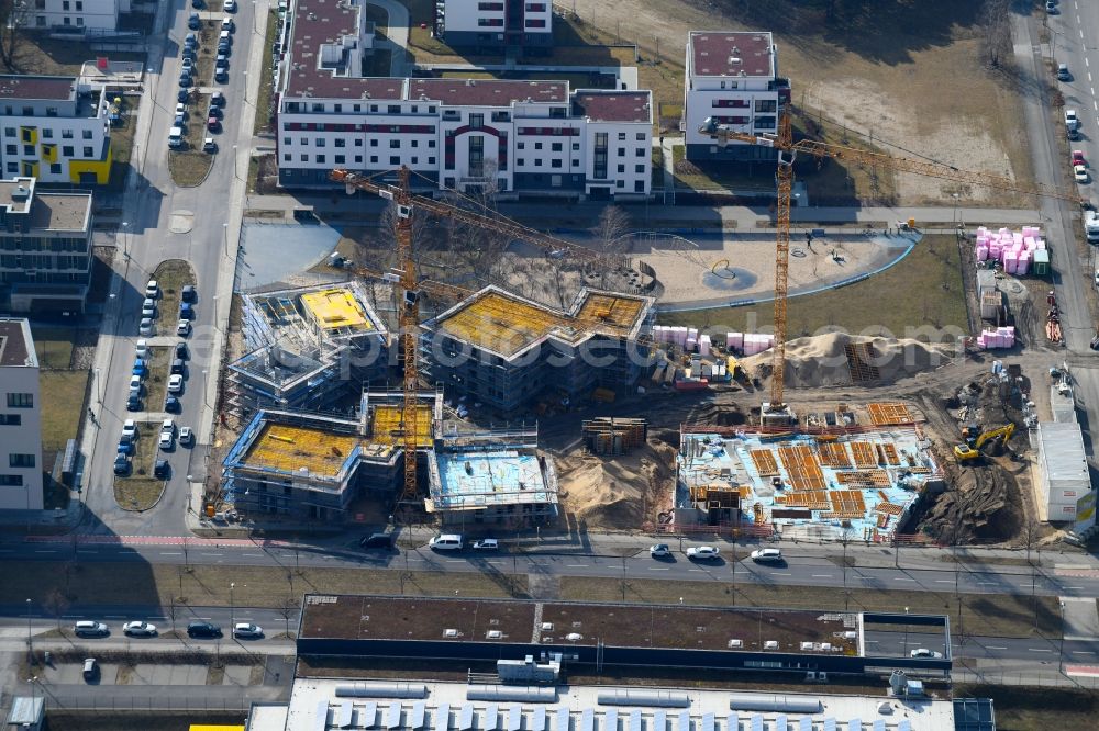 Berlin from the bird's eye view: Construction site to build a new multi-family residential complex a??Future Living Homesa?? between Gross-Berliner Damm - Konrad-Zuse-Strasse and Hermann-Dorner-Allee in the district Adlershof - Johannestal in Berlin, Germany