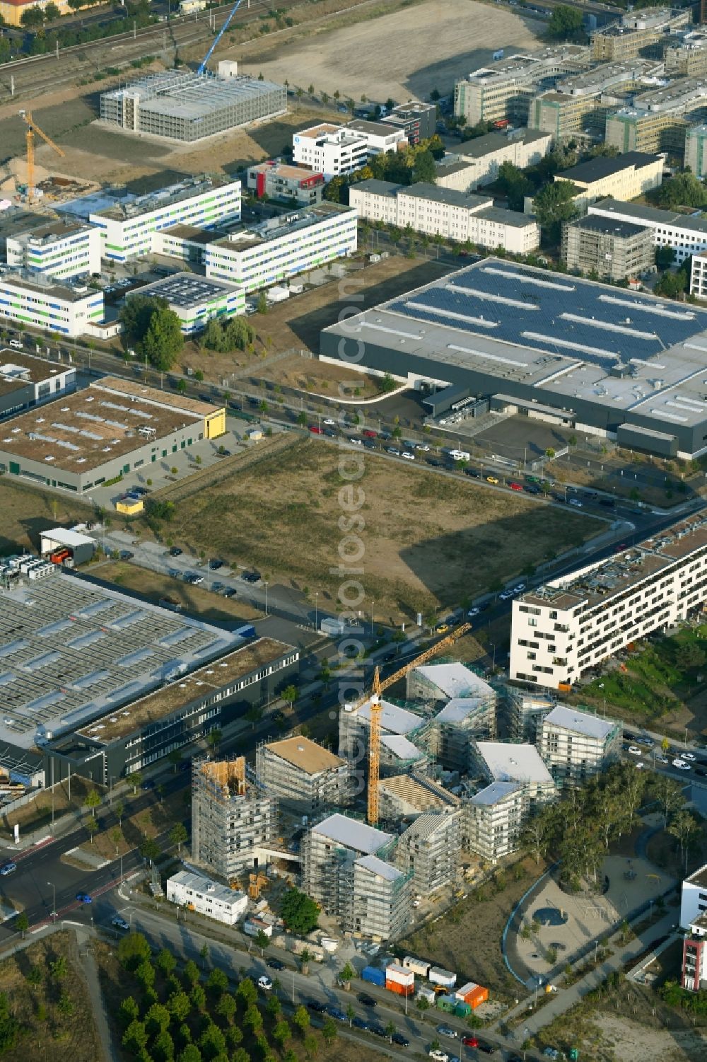 Berlin from the bird's eye view: Construction site to build a new multi-family residential complex Future Living Homes between Gross-Berliner Damm - Konrad-Zuse-Strasse and Hermann-Dorner-Allee in the district Adlershof - Johannestal in Berlin, Germany