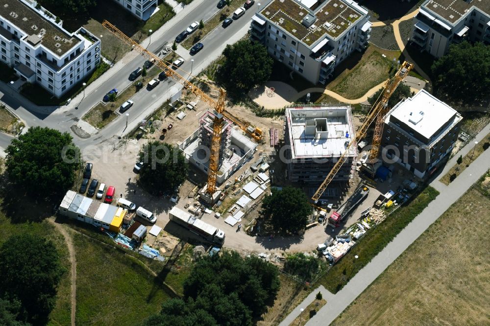 Berlin from the bird's eye view: Construction site to build a new multi-family residential complex Future Living Homes between Gross-Berliner Damm - Konrad-Zuse-Strasse and Hermann-Dorner-Allee in the district Adlershof - Johannisthal in Berlin, Germany