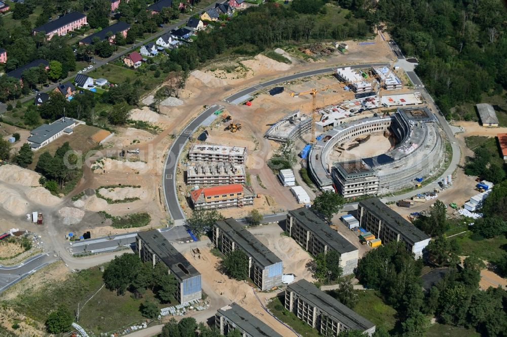 Wustermark from the bird's eye view: Construction site to build a new multi-family residential complex Gold- Gartenstadt Olympisches Dorf von 1936 in the district Elstal in Wustermark in the state Brandenburg, Germany