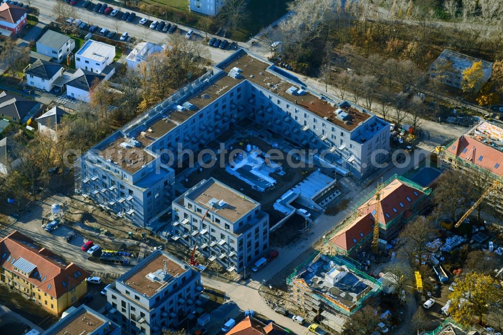 Berlin from the bird's eye view: Construction site for the construction of a multi-family house residential complex on the grounds of the former Kinderklinik Lindenhof on the Gotlindestrasse in the district of Lichtenberg in Berlin, Germany