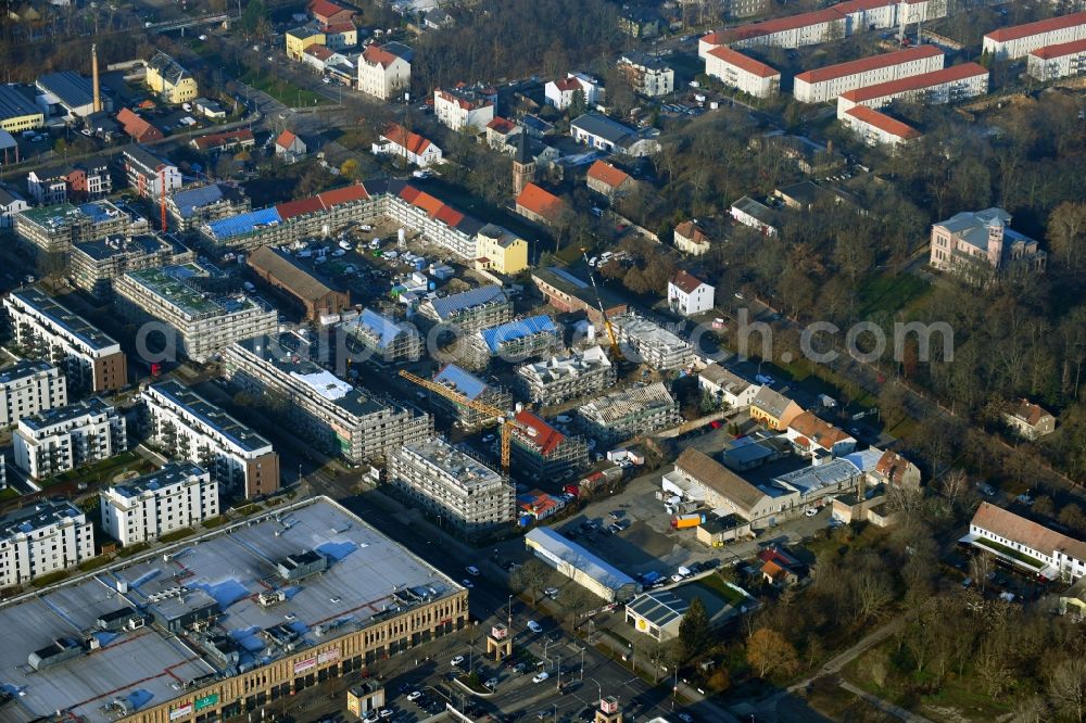 Berlin from the bird's eye view: Construction site to build a new multi-family residential complex of Gut Alt-Biesdorf on Weissenhoeher Strasse in Berlin, Germany