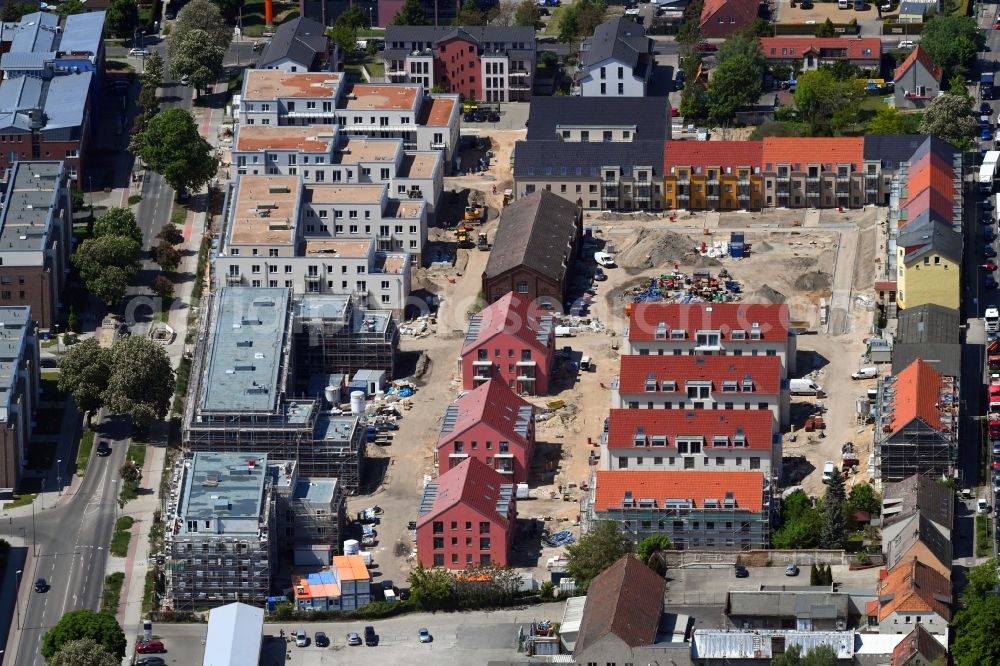 Berlin from the bird's eye view: Construction site to build a new multi-family residential complex of Gut Alt-Biesdorf on Weissenhoeher Strasse in Berlin, Germany