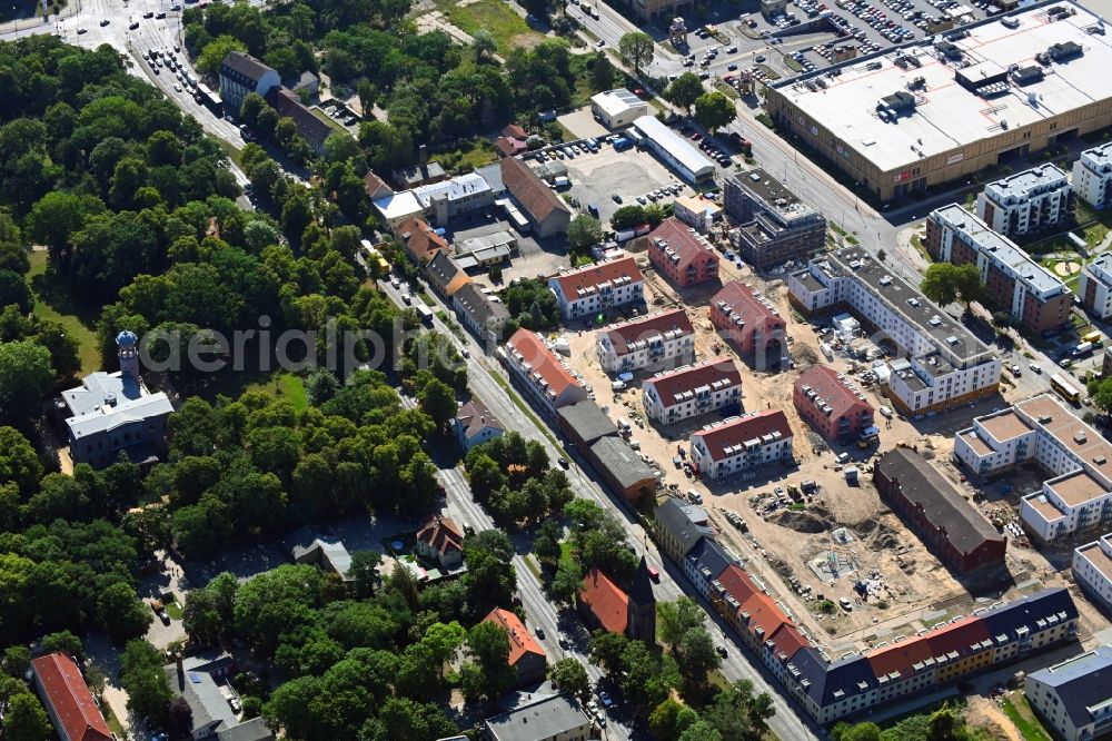 Berlin from above - Construction site to build a new multi-family residential complex of Gut Alt-Biesdorf on Weissenhoeher Strasse in Berlin, Germany