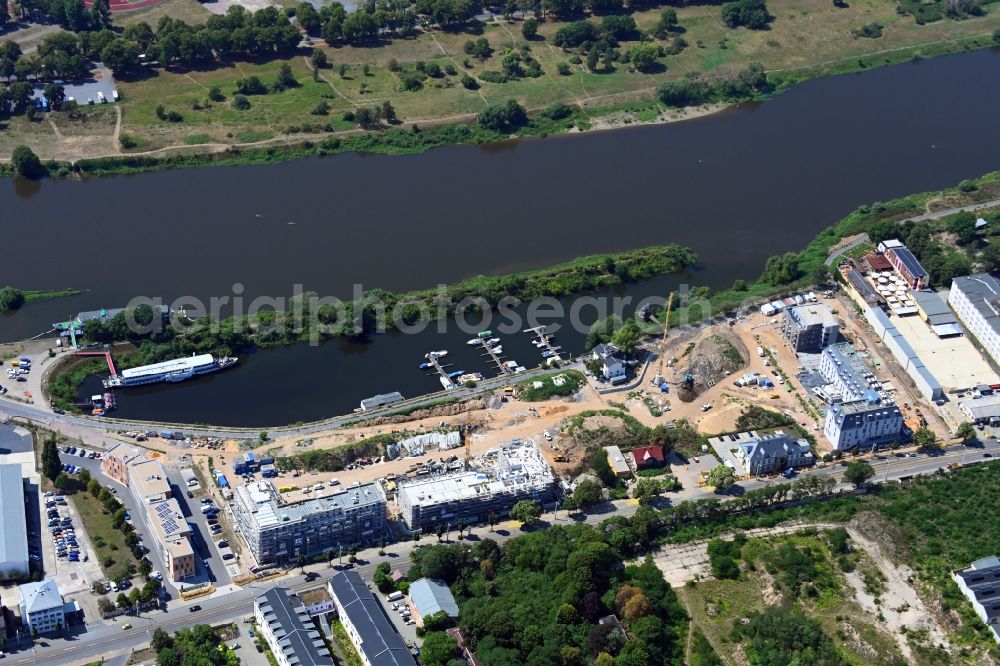 Aerial photograph Dresden - Construction site to build a new multi-family residential complex HAFENCITY Dresden on Elberadweg in Dresden in the state Saxony, Germany