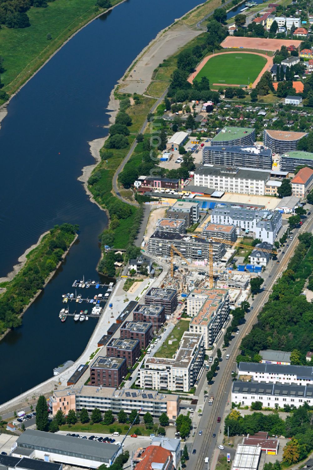 Aerial image Dresden - Construction site to build a new multi-family residential complex HAFENCITY Dresden on Elberadweg in Dresden in the state Saxony, Germany
